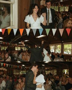 two people are kissing in front of a crowd