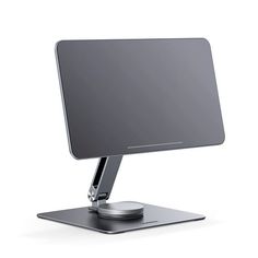 a computer monitor sitting on top of a metal stand