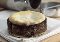 a cake sitting on top of a white napkin