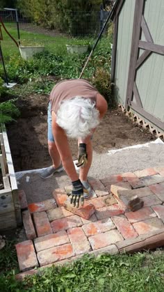 How to make a brick patio to easily add brick pavers to your garden area between your raised garden beds and container gardens. We had a pile of used brick we purchased from the Habitat for Humanity Restore in our area, and we decided to recycle them for this Hometalk DIY home improvement project. Rustic Brick, Growing Grass, Brick Pavers, Old Bricks, Brick Patios