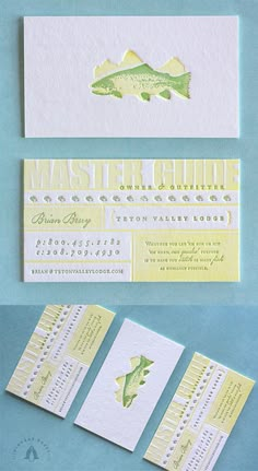 some type of business cards with fish on them and the words master guide written in gold foil