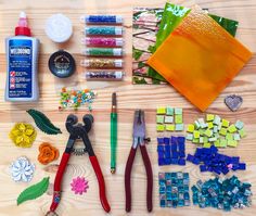 crafting supplies laid out on a wooden table