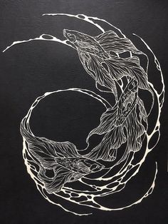 a black and white drawing of two fish in a circular design on a black background