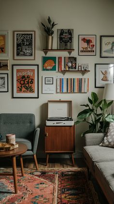 a living room filled with furniture and pictures on the wall