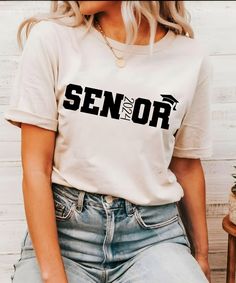 Celebrate graduation in style with a Senior 2024 Shirt, the perfect keepsake for the Class of 2024. These Senior Graduation Shirts make great senior gifts and are ideal for showing school spirit. ♥PRODUCTION TIME: 1-5 days (usually 2-3 days) ♥SHIPPING TIME: 2-5 days (usually 3 days) ♥PRODUCT DESCRIPTION: Bella Canvas Unisex T-shirt Super soft cotton and excellent quality print makes. 100% Soft cotton (fibre content may vary for different colors) Light fabric (4.2 oz/yd² (142 g/m Runs true to siz Gender Neutral Senior Shirts, Senior Tshirts Ideas, Senior Shirt Ideas 2025 Trendy, Senior Class Shirts Design, Senior Sunrise Shirts, Senior Shirt Designs, Senior T Shirts Ideas Design, Cute Senior Shirts, Senior Shirt Ideas