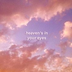 the words heaven's in your eyes against a blue and pink sky with clouds