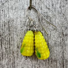 Time to take the garden jewelry collection to new heights! Or maybe a thoughtful gift for your favorite market vendor? Anyhow, we're pretty sure no one else will be wearing these at the next neighborhood potluck! Corn Jewelry, Market Vendor, Corn Earrings, Garden Earrings, Garden Jewelry, Glass Garden, Sweet Corn, The Garden, Thoughtful Gifts