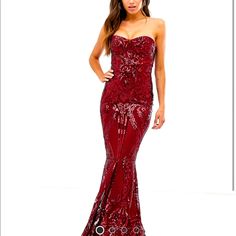 Great Quality Form Fitting, Sequin Floor Length Gown . Perfect For A Wedding Or Formal Event. Strapless Fitted Dress For Red Carpet, Strapless Evening Dress For Holiday Wedding, Strapless Evening Dress For Wedding Holiday, Strapless Holiday Evening Dress For Wedding, Red Strapless Sequin Evening Dress, Red Carpet Sweetheart Neckline Dress For Prom Season, Sweetheart Neckline Dress For Red Carpet Prom Season, Burgundy Maxi Dress For Wedding, Strapless Red Evening Dress For Party Season