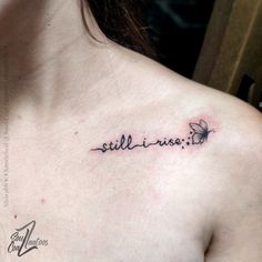 a woman with a small tattoo on her chest saying still i miss you in cursive writing