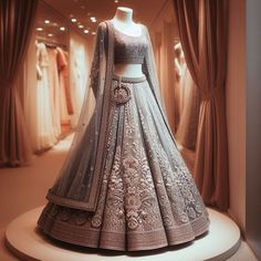 a mannequin dressed in a wedding dress on display at a bridal event