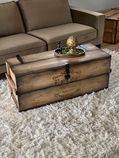 a coffee table made out of an old trunk