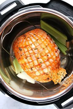 the food in the pot is ready to be cooked and put into the slow cooker