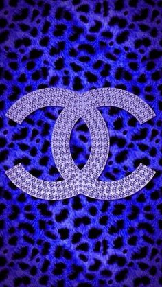 the chanel logo is shown on a leopard print background in purple and blue colors