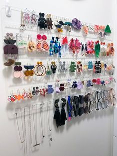 there is a wall display with many items on it