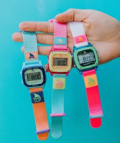 Dive into retro vibes with the Blue Melon, Freestyle Watches' freshest digital surf watch. Infused with muted neons inspired by the vibrant 80s and 90s, this timepiece brings a wave of nostalgia to your style. Make a bold statement where function effortlessly meets fashion, whether you're riding the waves of tides or trends. Blue Melon Shark Watch doesn't just look good; it's designed to seamlessly function in and out of the water, making it your ideal companion for catching waves with confidenc Casual Watches With Stopwatch, Casual Blue Watch With Stopwatch, Shark Watch Aesthetic, Freestyle Shark Watch, Free Style Shark Watch, Shark Clip Watch Preppy, Shark Clip Watch Aesthetic, Shark Watch With Bracelets, Freestyle Shark Apple Watch Band