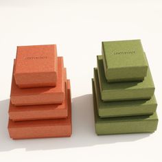 four different colored boxes stacked on top of each other with the word convention written on them