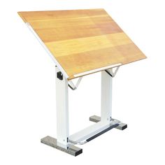 a wooden table sitting on top of a metal stand with wheels attached to the legs