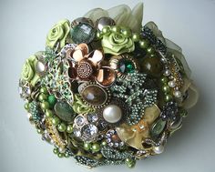 a close up of a brooch bouquet on a table