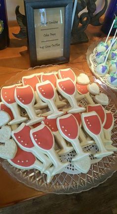 some cookies and cupcakes on a table