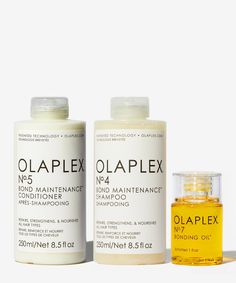 A shampoo, conditioner and hair oil set.Show your hair you care with the OLAPLEX Healthy Hair Trio. With formulas developed to care for damaged hair, this trio features the iconic OLAPLEX No.4 Bond Maintenance Shampoo, which seals split ends, smooths frizz and relinks broken bonds. As well as the OLAPLEX No.5 Bond Maintenance Conditioner, a colour-safe conditioner that repairs damage and deeply moisturises. Add the finishing touches with the OLAPLEX No.7 Bonding Oil, a weightless styling oil tha Oplex Hair Shampoo And Conditioner, Olaplex Hair Care, Olaplex Hair Set, Olaplex Mini Set, Olaplex Set, Oplex Hair Oil, Opalex Hair Shampoo And Conditioner, Trending Hair Products, Olaplex Shampoo And Conditioner