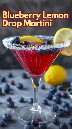 the blueberry lemon drop martini is garnished with sugar