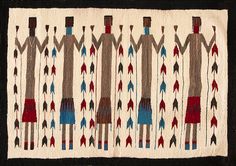 an old native american rug with several people holding hands and arrows on the front side