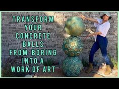 a man balancing balls on top of each other in front of a brick wall with the words transform your concrete balls from boring into a work of art