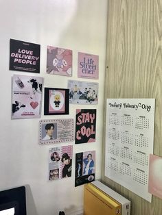 the wall is covered with posters and magnets for every type of person in the room