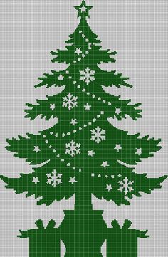 a cross stitch christmas tree with two bears