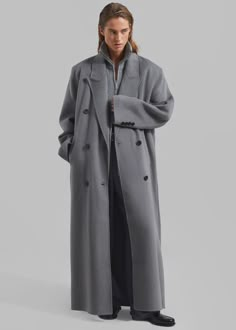 Color: Grey Midweight wool blend fabric Oversized silhouette Peak lapels Drop shoulders Welt hip pockets Double breasted front button closure Lined 80% Wool 20% Polyamide Dry Clean By The Frankie Shop. Imported Oversized Wool Coat, Oversized Trench Coat, Winter Lookbook, The Frankie Shop, Tailored Coat, Frankie Shop, Long Wool Coat, Maxi Coat, Grey Coat