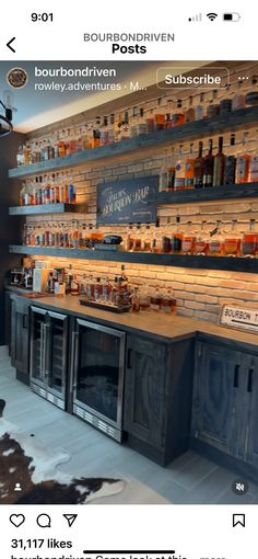 an image of a bar with lots of bottles on the wall and shelves in front of it