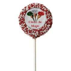 a red and white lollipop with the words cinco de mayo on it