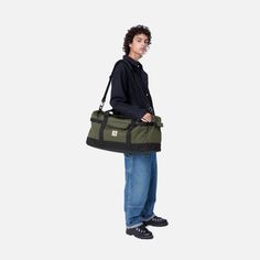 Color: Office Green - The Jack Duffle Bag is constructed from water-repellent, recycled polyester canvas. The style features a main compartment with a two-way zip closure and adjustable webbing straps. Further functional details include a front pocket with flap and interior pocket with a zip closure. The bag is unlined with binding at all inside seams, and is finished with a classic woven Square Label on the front pocket. _* 100% Recycled Polyester Canvas, 11.25 oz, 53.5 x 24 x 26 cm / 21 x 9.4 Office Green, Black Office, Clothing Retail, Bags Aesthetic, A Perfect Circle, Online Mens Clothing, Water Repellent Fabric, Carhartt Wip, Kids Sleepwear