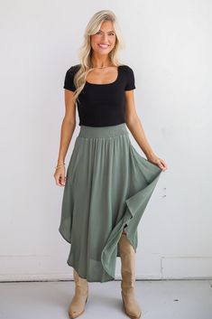 If you have iconic intentions, then the Sensational Purpose Olive Midi Skirt is the perfect look to achieve them! Designed with a flattering high-waisted fit, this skirt gracefully drapes to a midi length, creating a beautiful, flowing silhouette that moves with you. The rich olive hue adds a sophisticated, earthy tone that pairs beautifully with both neutrals and vibrant colors, making it a versatile addition to any closet. Crafted from lightweight, breathable fabric, this skirt offers a soft, Chic Office Outfit, Casual Kimono, Flowy Design, Trendy Skirts, Rust Dress, Chic Office, Skirts For Women, Puff Sleeve Dresses, Casual Jumpsuit