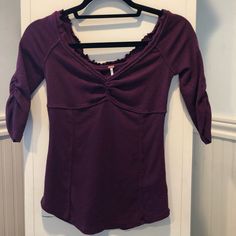 I Bought This A Couple Years Ago But Have Never Worn It! It’s A Maroon Off The Shoulder Top With 3/4 Ruched Sleeves, Lettuce Trimmed Neckline, And Ruched Detail Around The Bust Area! Size Medium Y2k Fall Purple Tops, Vintage Purple Top, Bohemian Long Sleeve Purple Tops, Vintage Purple Long Sleeve Tops, Purple Long Sleeve Bohemian Top, Goth Princess, Free People Tops, Shoulder Top, Off The Shoulder