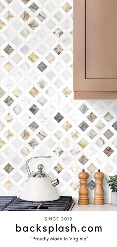 kitchen backsplash with white tile and wood cabinetry in the back drop area