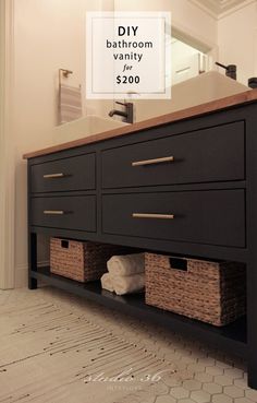 a bathroom vanity with two baskets under the sink