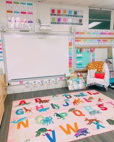 a child's room with colorful rugs and toys on the floor