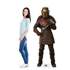 two women standing next to each other wearing costumes that look like they are from star wars