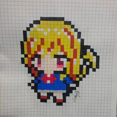 an image of a pixel art made out of legos on a sheet of paper