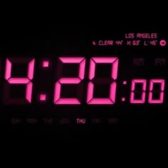 an alarm clock with the time at 9 00 pm on it's display screen