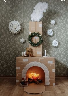 a room with a fireplace and decorations on the wall