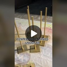 an image of gold candles with the words centerpiece stands under $ 3