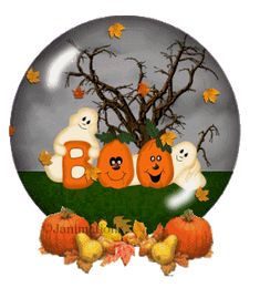 a snow globe with pumpkins and ghost on it