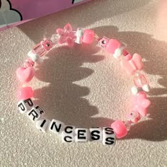 every princess needs this bracelet in their life 👑💗 details ❥ approximately 6.5 inches & super stretchy 🐛 ❥ can be adjusted to your sizing :) 🌈 ❥ want this same design but want it to say something else? i can do that ⚡️ Disney Kandi Bracelets, Cartoon Bracelet Ideas, Rave Candy Bracelets Ideas, Kandi Sayings, Pony Bead Bracelet Ideas, Bracelet Sayings, Bracelets Kandi, Princess Bracelet, Bracelet Y2k