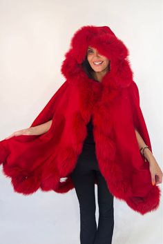 - Luxury fox fur collar - Cashmere cape - Arm holes - Midi length - 100% cashmere - 100% real fox fur - Fits approximately UK 8-14 & US 4-10  Cashmere and Fox Fur Hooded Cape Geometric Coat, Faux Fur Headband, Fur Gloves, Faux Fur Bag, Cashmere Cape, Fur Cape, Faux Fur Hat, Capes & Ponchos, Hooded Cape