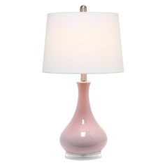 a pink table lamp with a white shade