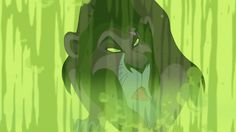 an animated image of a lion with green eyes and black hair, standing in front of trees