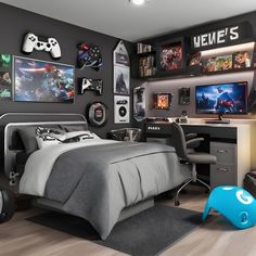 a bedroom with a bed, desk and various video game memorabilia hanging on the wall