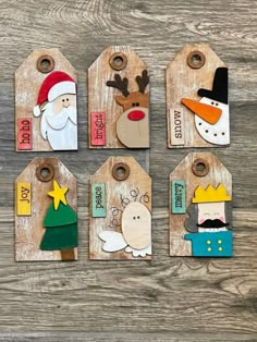 wooden tags with christmas decorations on them